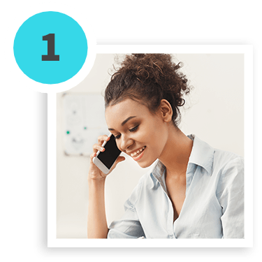 1 - Woman smiling while talking on the phone