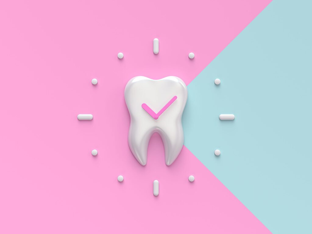 3D tooth-shaped clock with pink and blue background