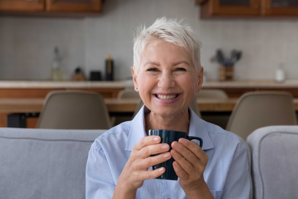 Woman smiling on a couch